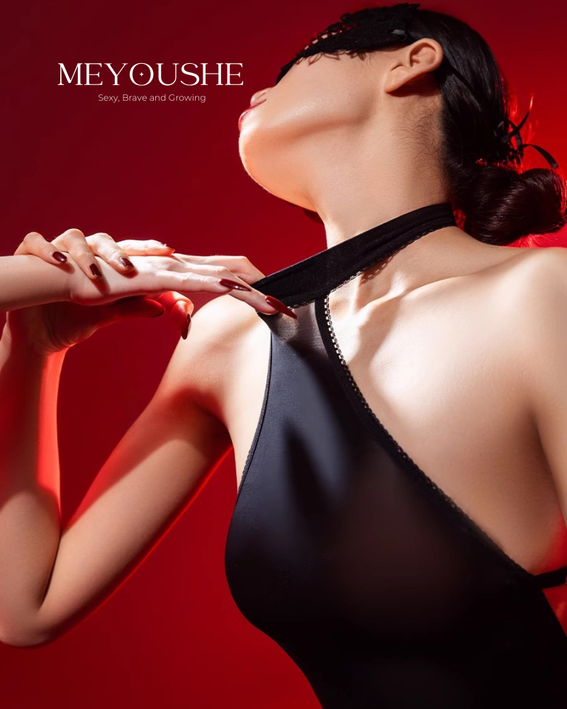 Female model showcasing Elara sparkling back bodysuit, perfect for intimate or everyday wear