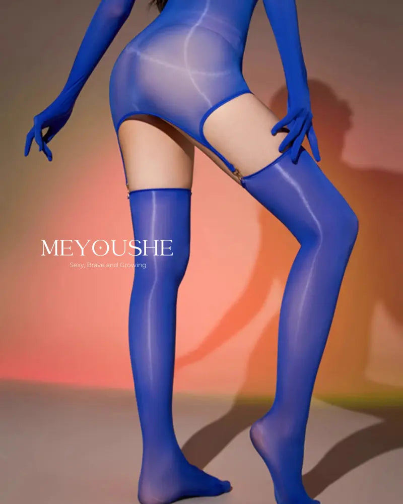 Serenya minimalist iridescent one-piece bodysuit worn by model, highlighting spaghetti strap design